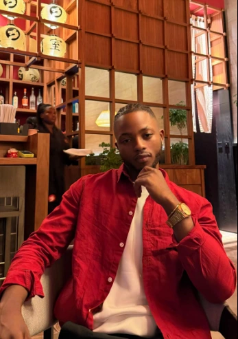 Rina Boy in a red shirt